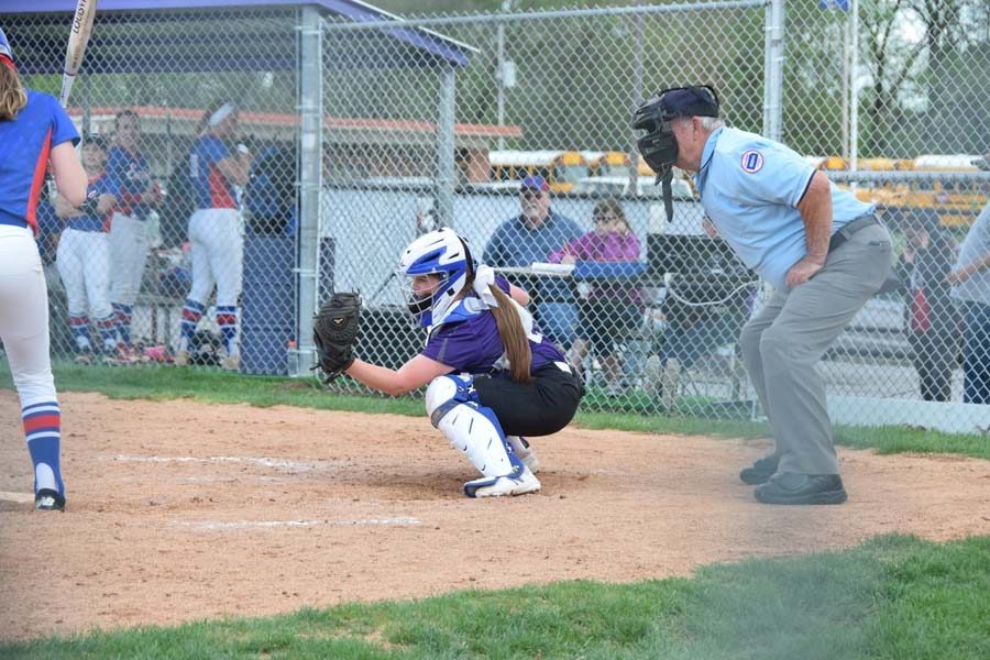 Freshman Kaitlyn Bradbury frames a pitch. 