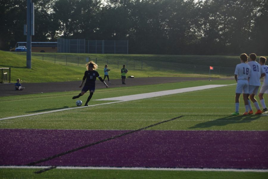 Senior Ronin Richardson takes a shot at the goal during a penalty kick. 