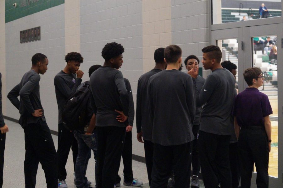 The Pirates huddle up and talk about the game plan before the semi-final versus Gardner. The Pirates are led by seniors Trey Bates, Braijon Barnes, and Brandan Jackson.