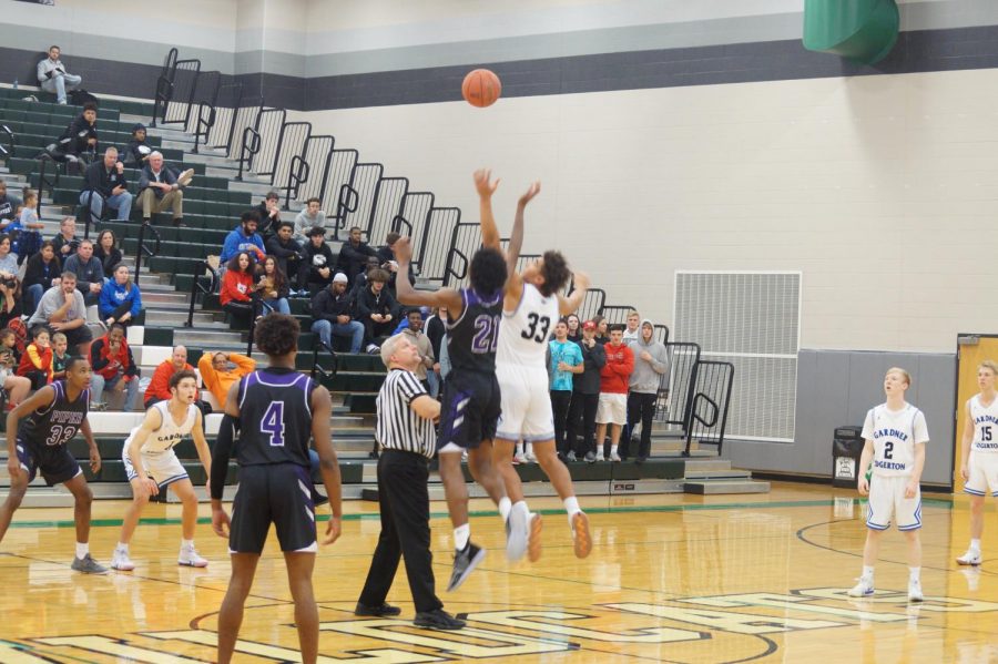 Senior Brandan Jackson wins the tip off versus Gardner. This is his 4th year playing basketball at Piper, and 2nd year as a starter.