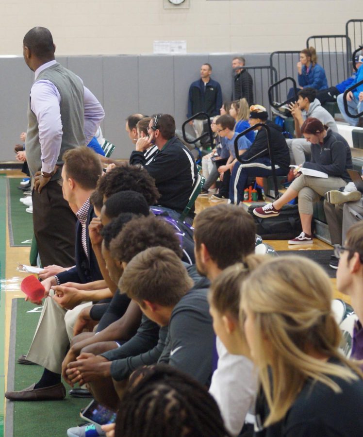 The Pirates’ bench looks on as they run the clock out at the end of the game. Piper beat Gardner by a final score of 72-62.
