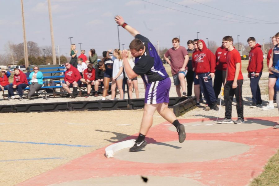 Senior Cooper Beebe throws shot put in a meet at Eudora on April 18, 2019