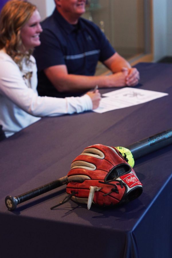 Senior Emma Martin signs to play at Johnson County Community College on Nov 13 at Piper High School. 