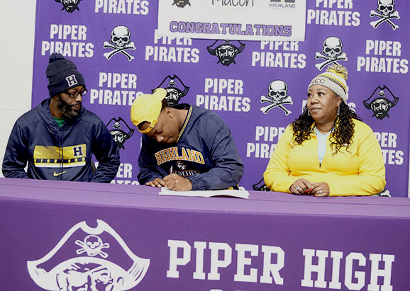 Future Scottie Cory Macon signs to Highland Community College, to continue football career. 